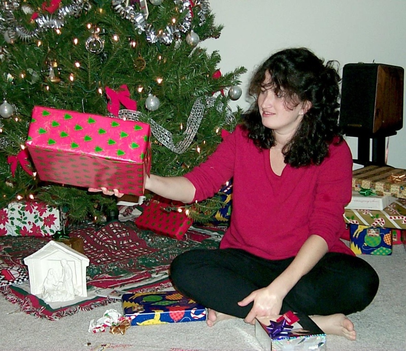 1999-12-22-Suzi-handing-out-gifts.jpg